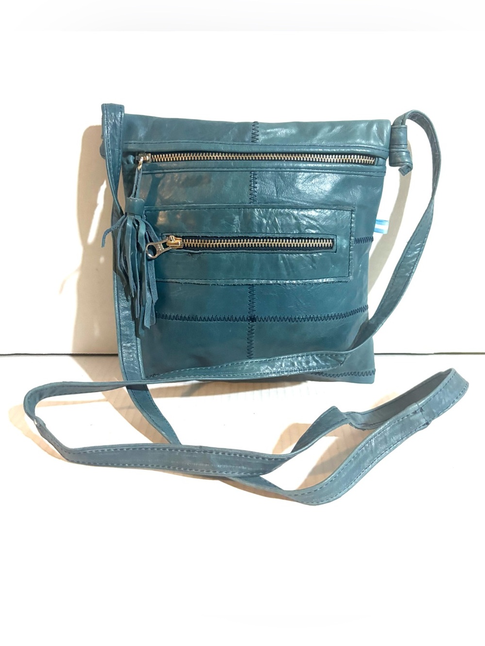 Teal Leather Crossbody Bag with Fringe Zipper Pulls